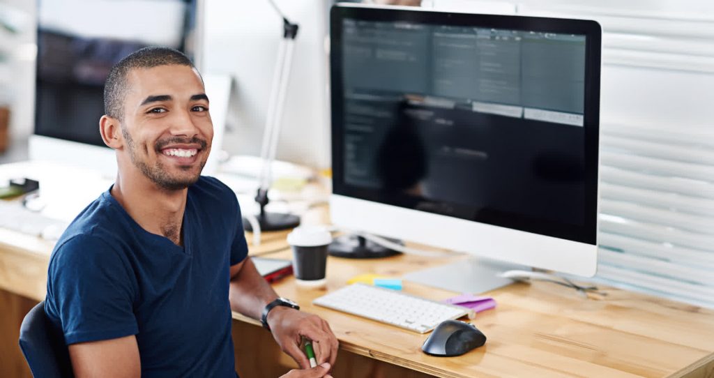 ClickIT developer working smiling